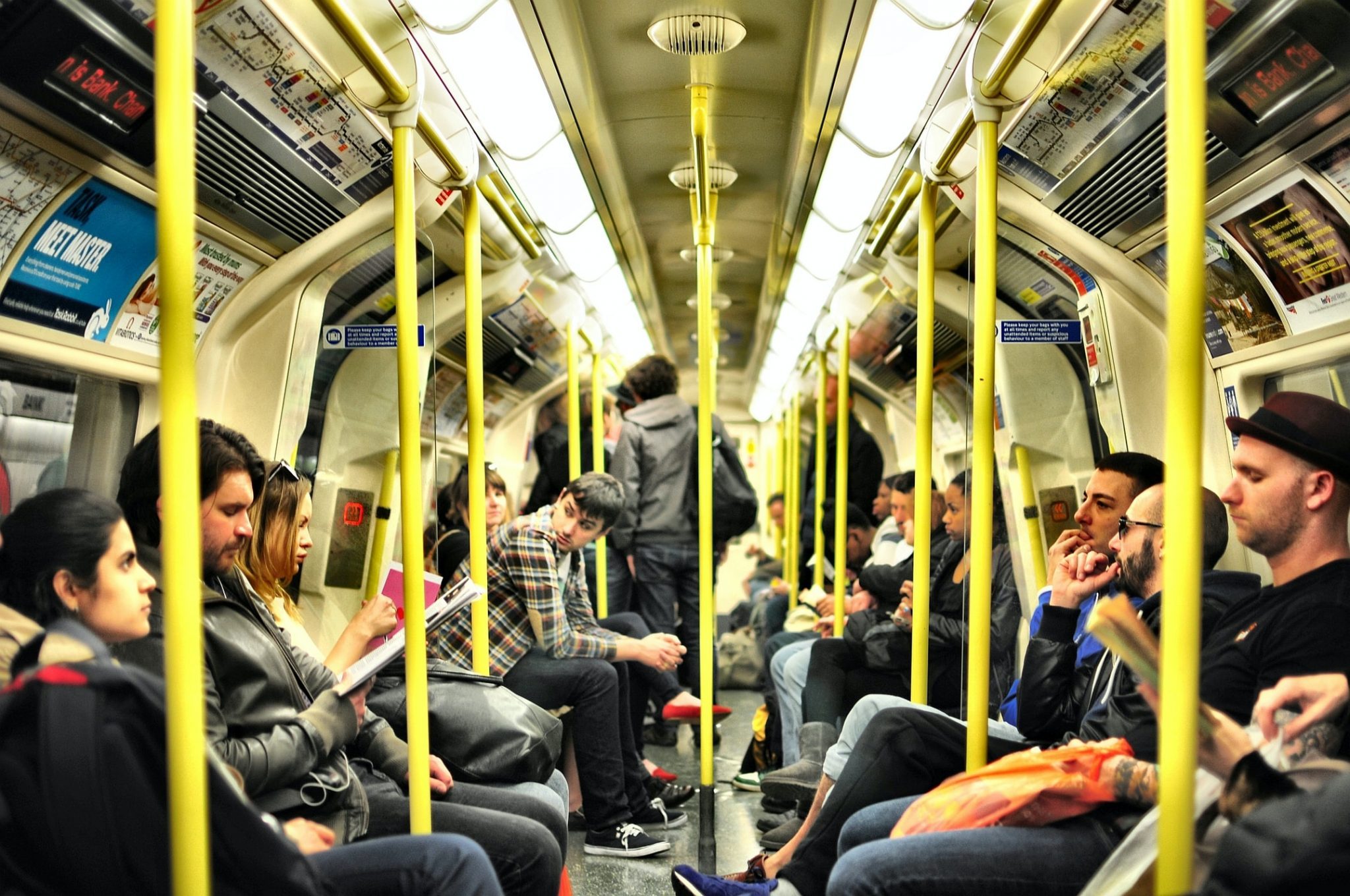 many-people-sat-on-a-train-commuting-to-work