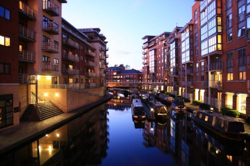 shot-of-birmingham-city-with-a-river-in-the-evening