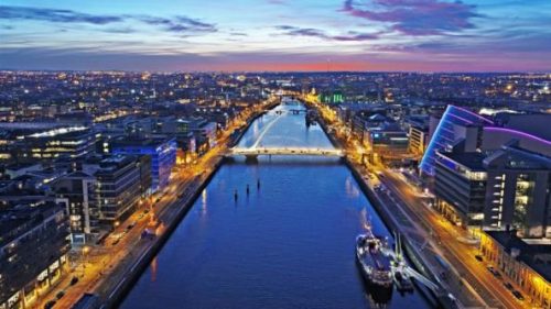 an-aerial-shot-of-dublin-city-showing-its-river-during-the-evening
