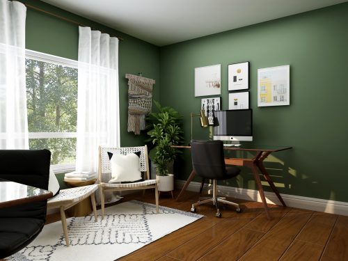 image-of-a-home-office-set-up-with-deep-green-walls-and-lots-of-natural-light