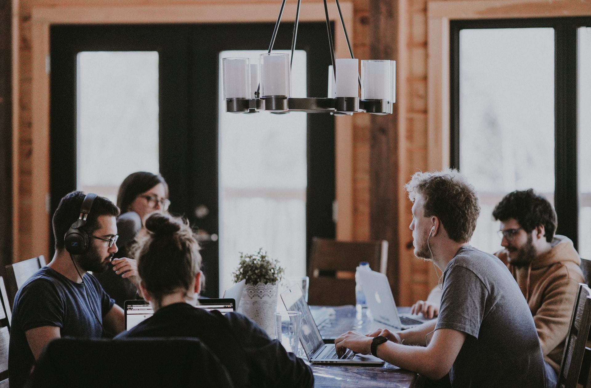 employees-working-together-around-a-table