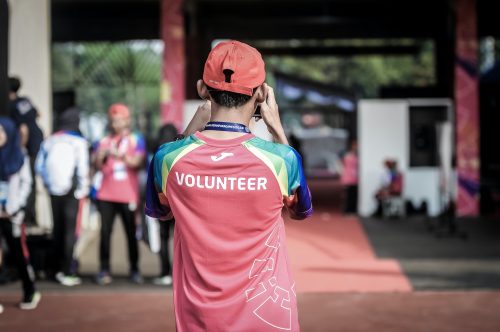 shot-of-someone-from-behind-wearing-a-shirt-that-says-volunteer