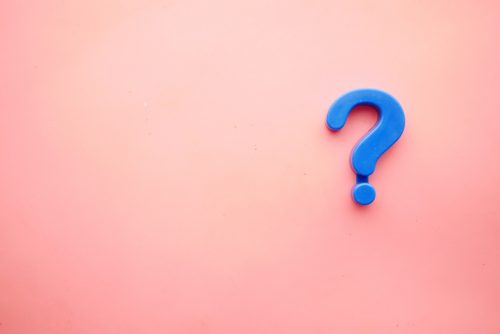 image-of-a-blue-question-mark-against-a-pink-background
