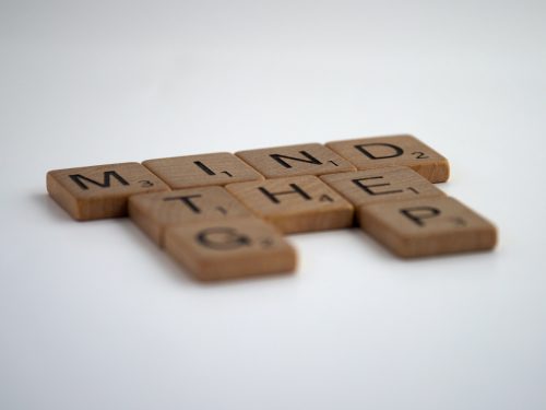 scrabble-tiles-showing-the-phrase-mind-the-gap-but-with-the-A-missing-in-gap