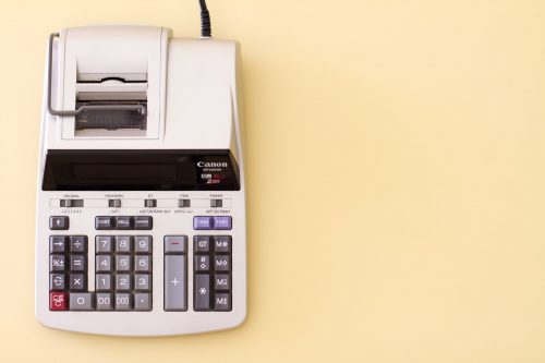 image-of-a-printing-calculator-used-to-help-businesses-budget