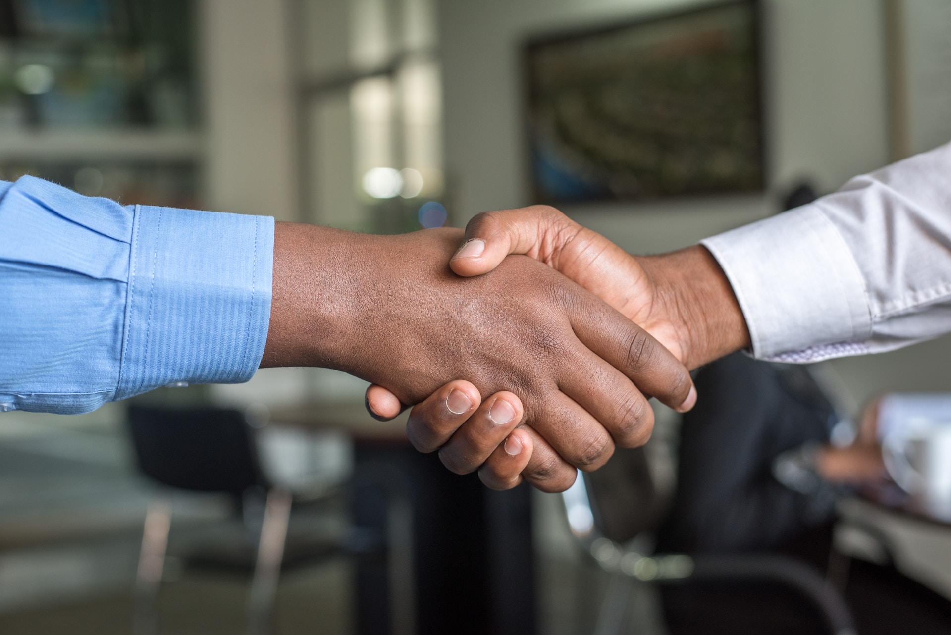 close-up-of-two-people-shaking-hands