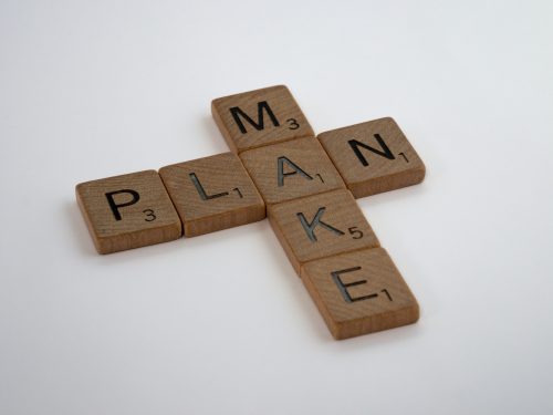 scrabble-tiles-placed-on-white-background-with-the-intersecting-words-make-and-plan