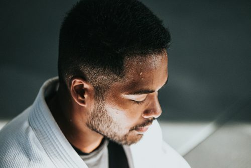 side-shot-of-a-man-with-sweat-running-down-his-forehead